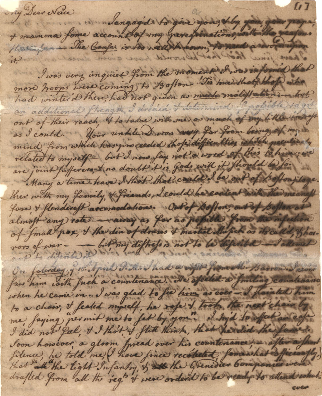 Cursive text on aged paper, with some repairs where the paper was folded