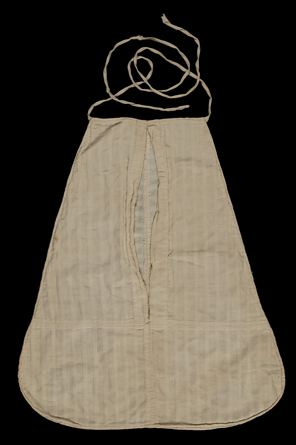 A large white fabric pocket (approximately 14