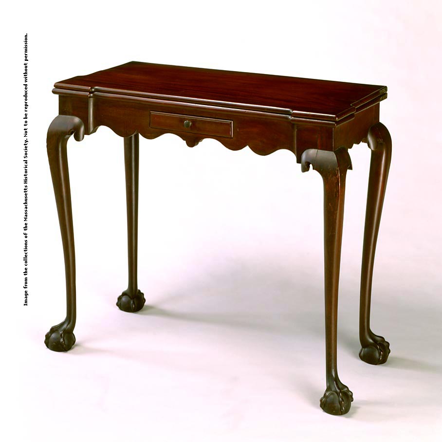 a folding mahogany desk with one drawer and tapered legs ending in claw-and-ball feet